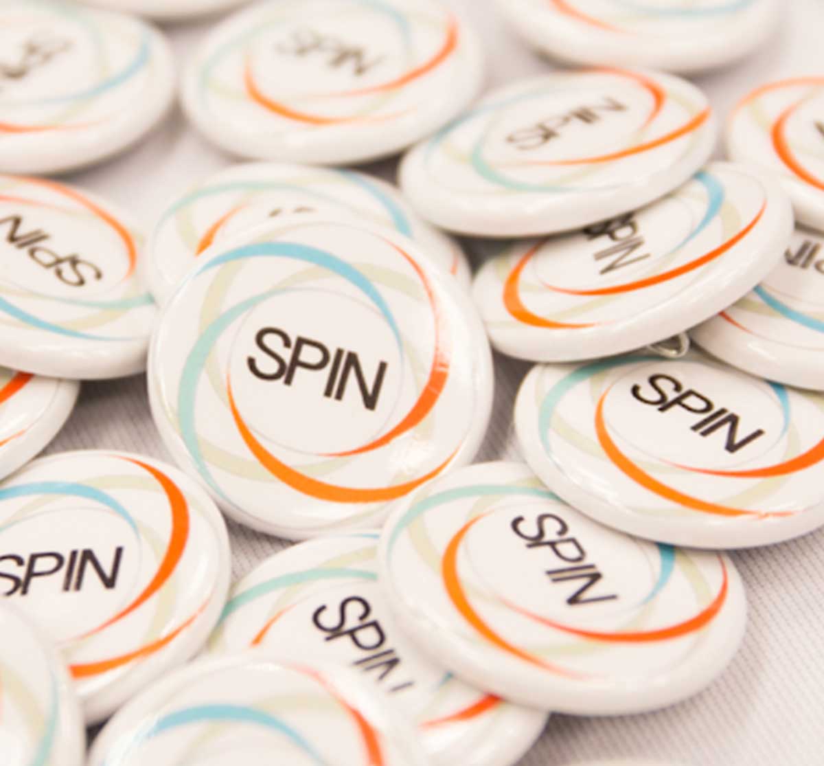 Buttons with the words SPIN on them